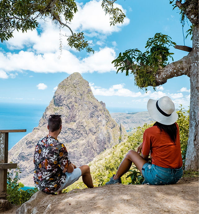 Couple admiring the dramatic mountain views in St Lucia