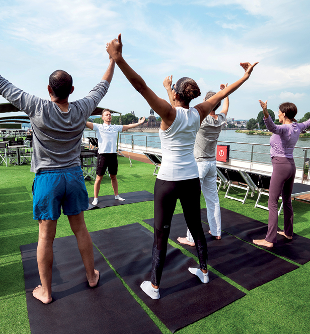 A group of people stretching in one of the star ships