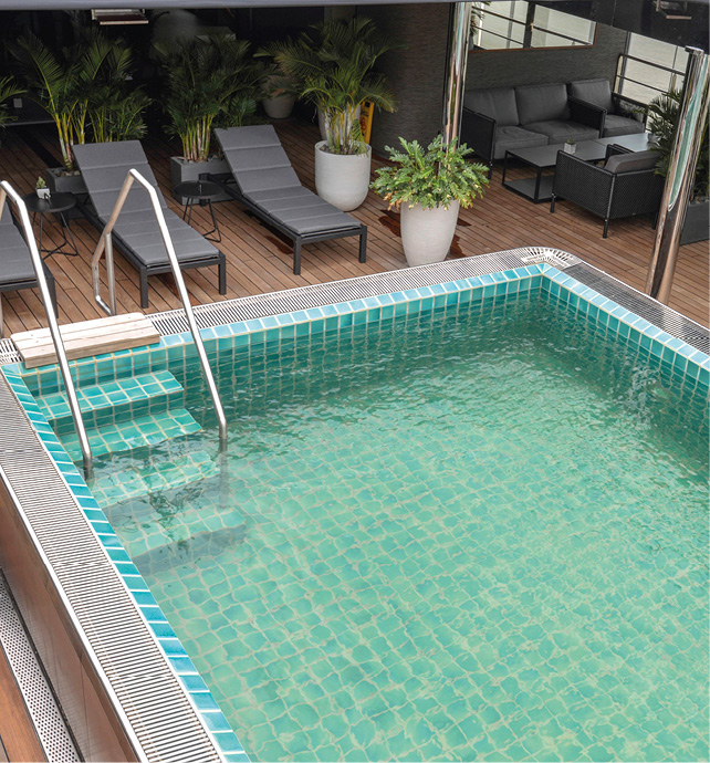 The cooling pool on board Emerald Harmony, with sun seating and freshly scrubbed decking 