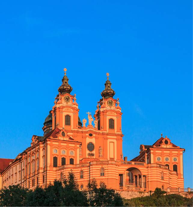 Views of Melk Abbey against a blue sky